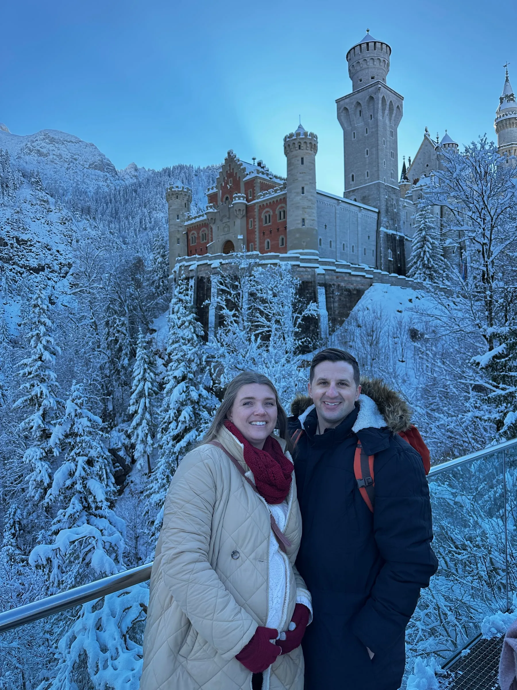 Michael and Chantelle in front of Neuschwanstein Castle in the snow