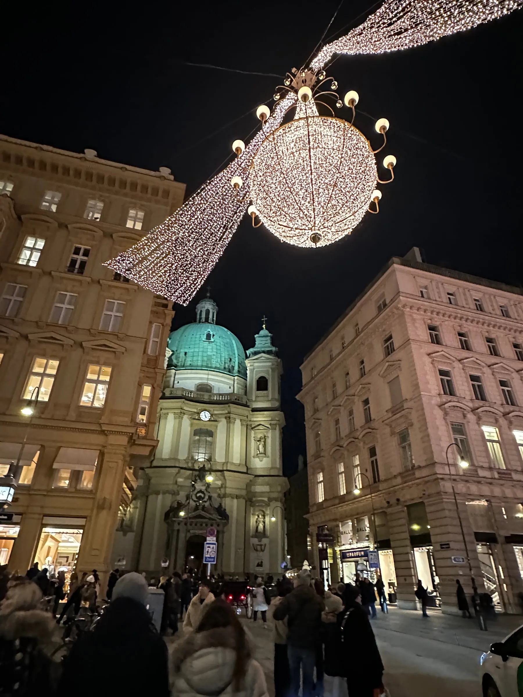 Christmas lights strung over the Graben shopping street in Vienna at night